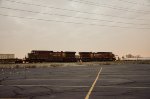 CP AC44CW Locomotives leading a train